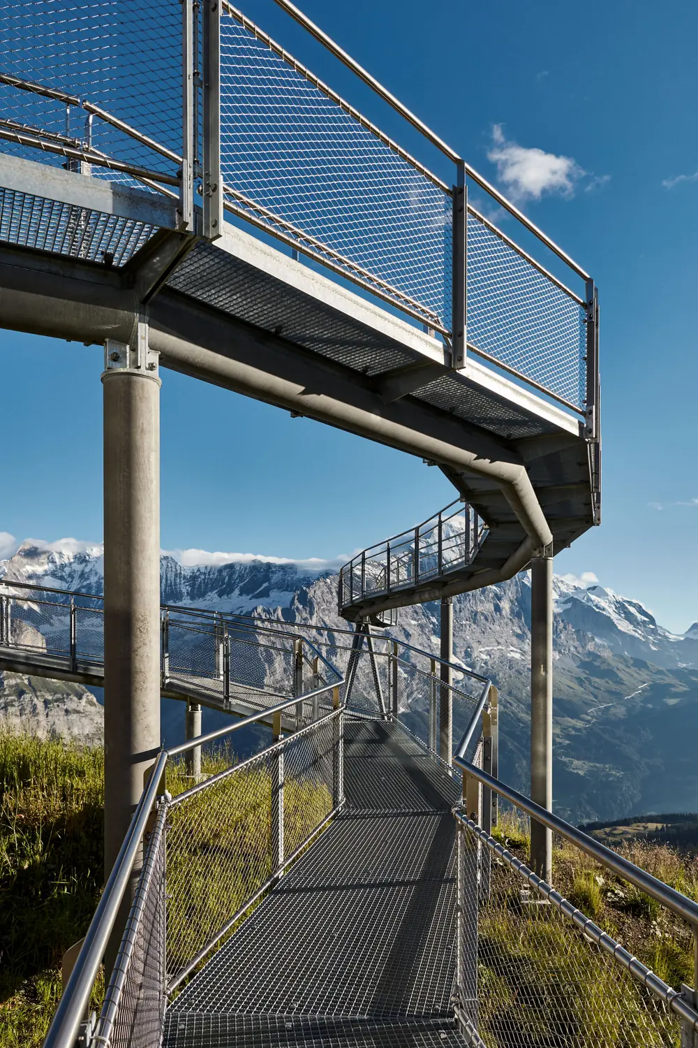 A mesh guard on a mountain walkway