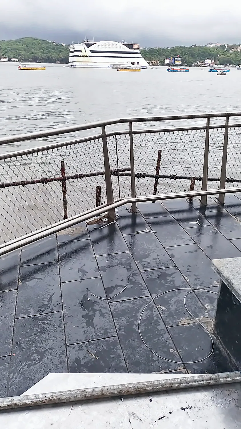 Stainless railing at the river edge, Panjim